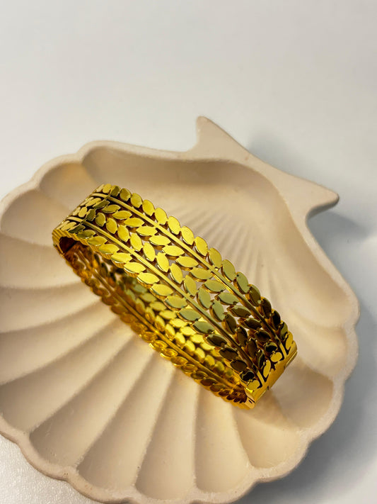 prominent triple-row leaf bangle
