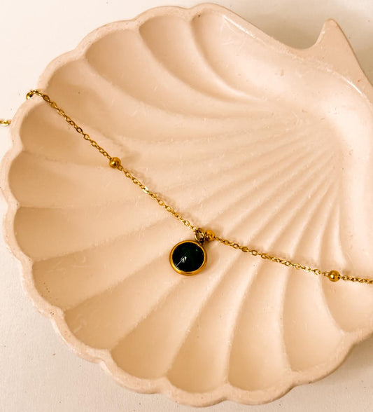 Dainty gold-plated round green onyx pendant