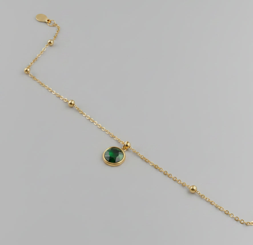 Dainty gold-plated round green onyx pendant