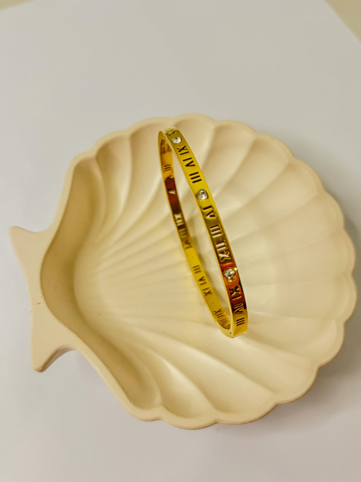 Roman numerical kada bracelet
Price