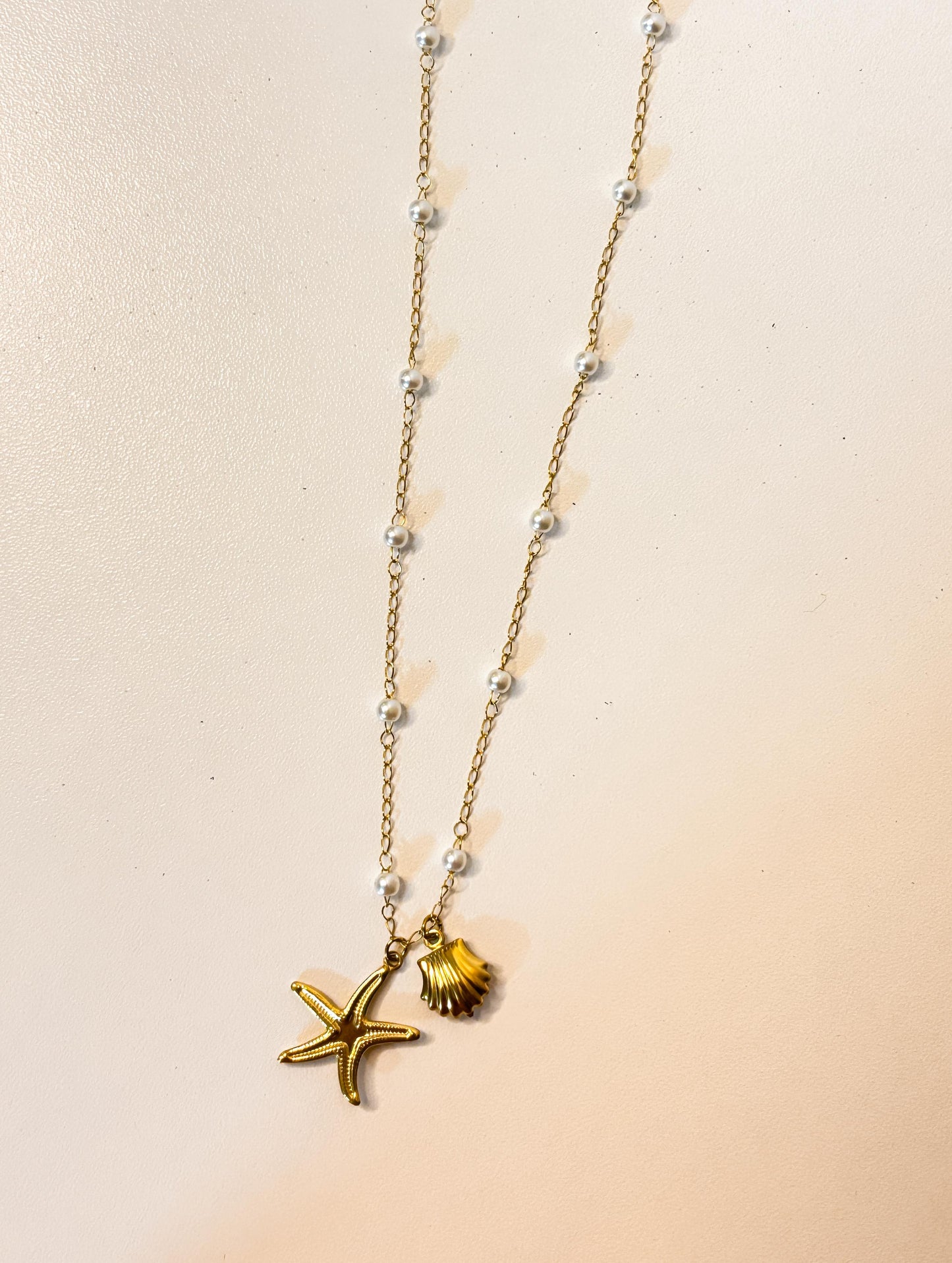 Gold plated starfish and seashell pendants