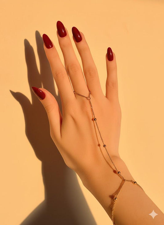 Golden beaded hand chain bracelet